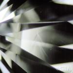 A close up of a diamond with a grain center.