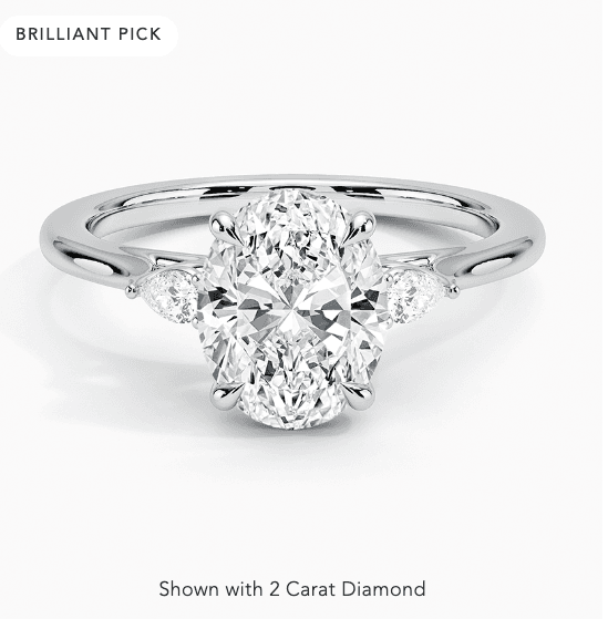 Perfect fit three stone pear diamond ring.