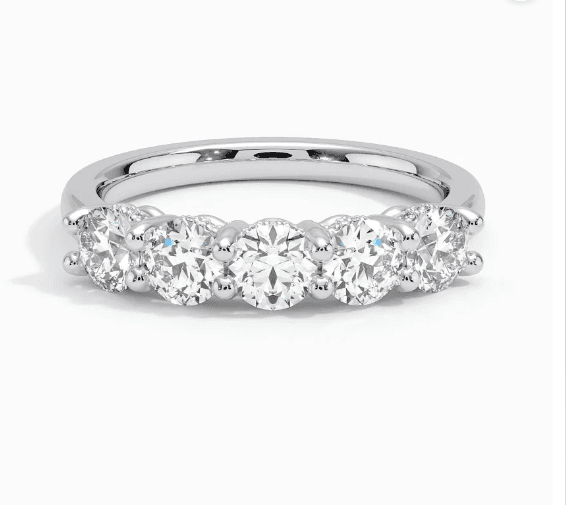 Adorned five stone diamond ring.