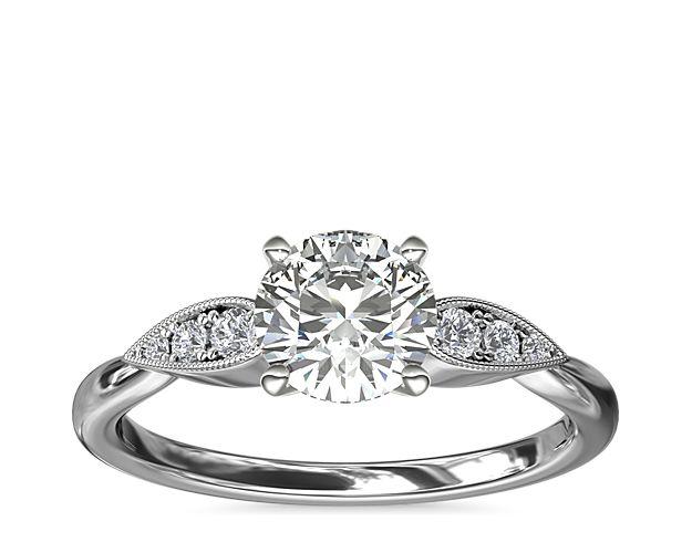 Floral cluster diamond ring.