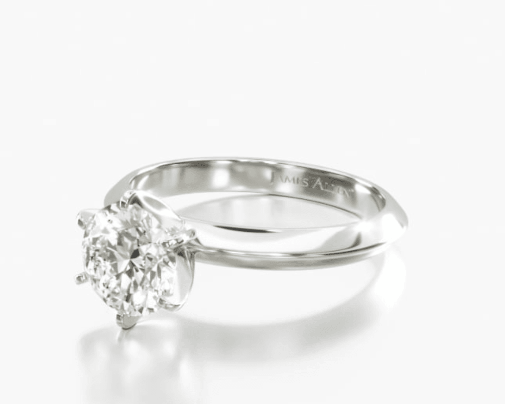 Solitaire engagement ring.