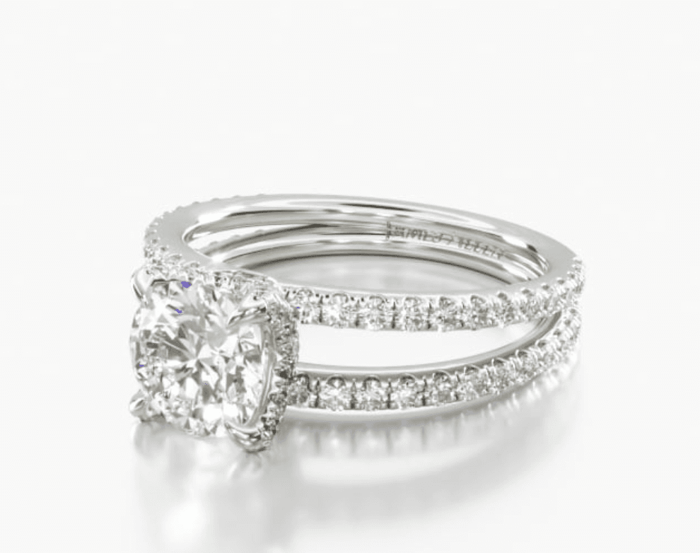 Platinum pave split shank diamond ring.