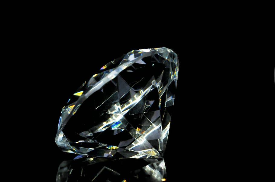 A smooth and shiny diamond showing off it's polish
