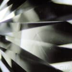 A close up of a diamond with a grain center.