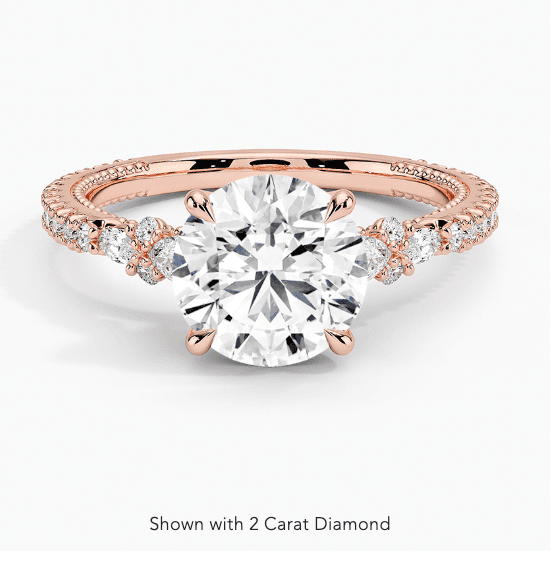 Floral cluster diamond ring.