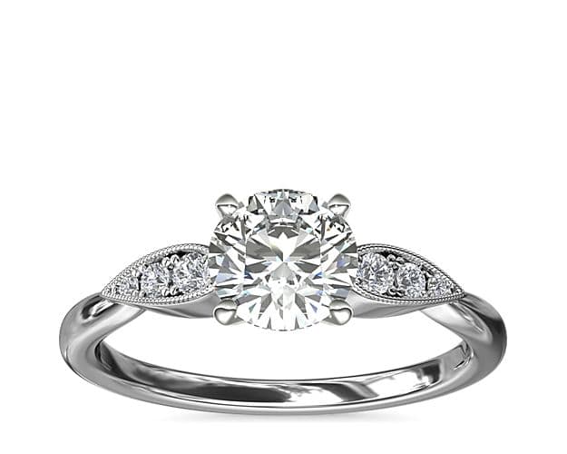 Floral cluster diamond ring.