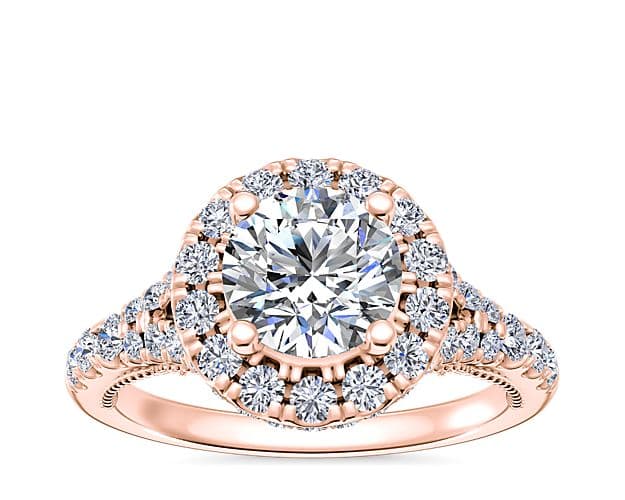 Lace bridge split shank halo diamond ring.