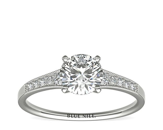Graduated milgrain diamond ring in platinum.
