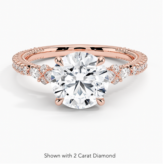 Floral cluster diamond ring.
