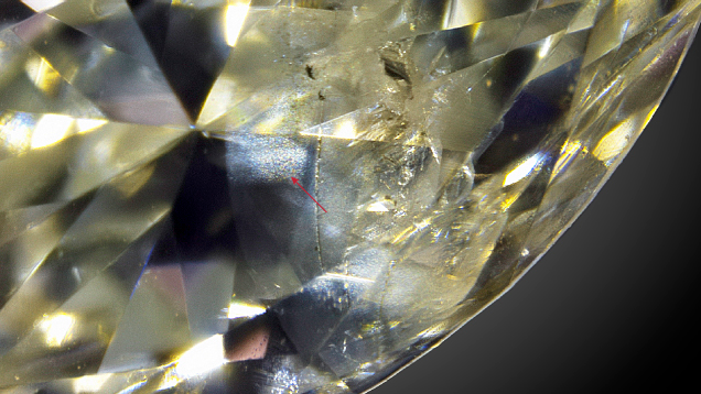 GIA microscope photograph of cloudy filler in a mounted marquise diamond